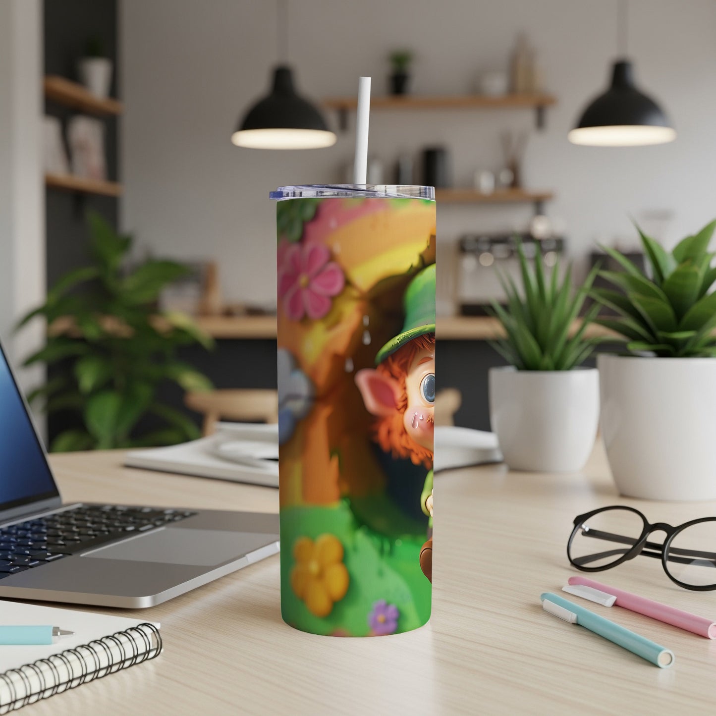 Leprechaun and floral design on a white insulated tumbler with straw.