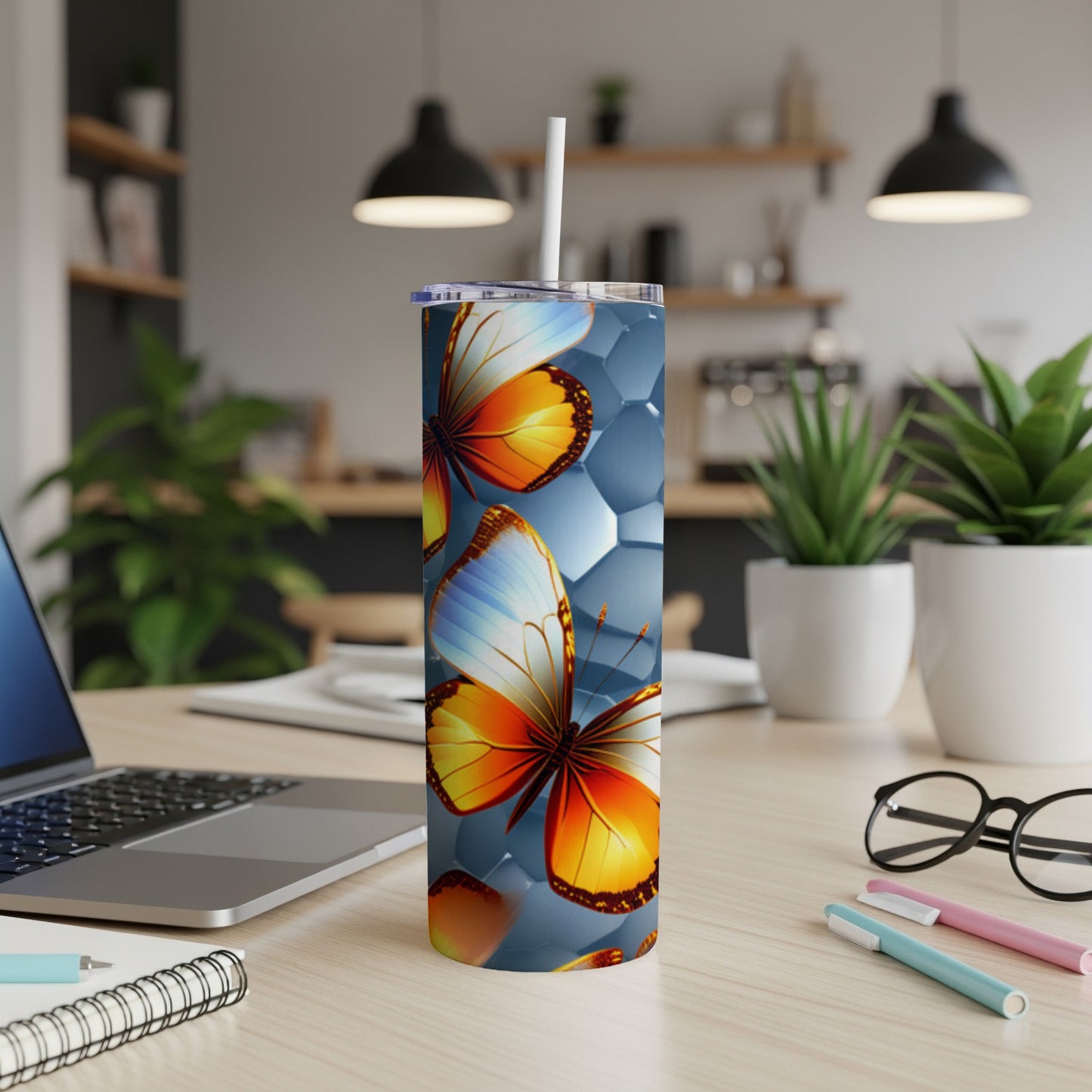 Tumbler with colorful butterflies and honeycomb pattern.