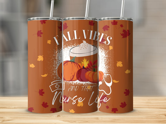 Fall Vibes and That Nurse Life tumbler with pumpkins and fall leaves.