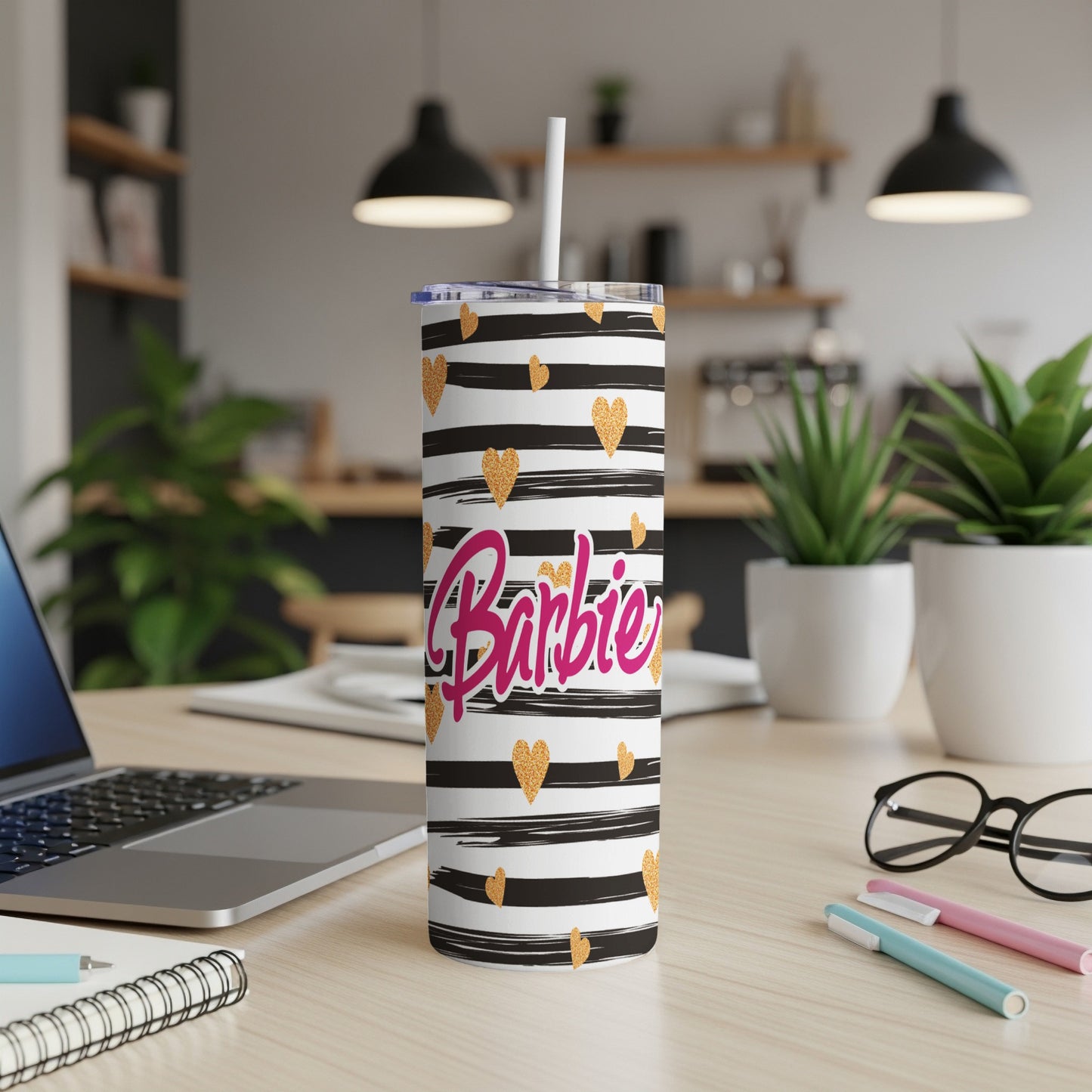 Black and white striped tumbler with gold hearts and "Barbie" text.
