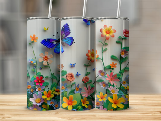 Three tumblers with colorful floral designs and butterflies.