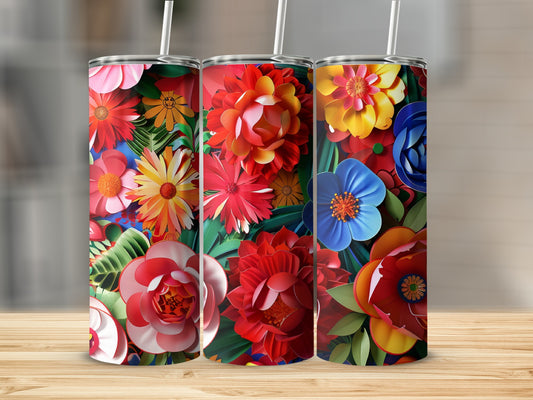Three tumblers with vibrant floral patterns, including roses and daisies.