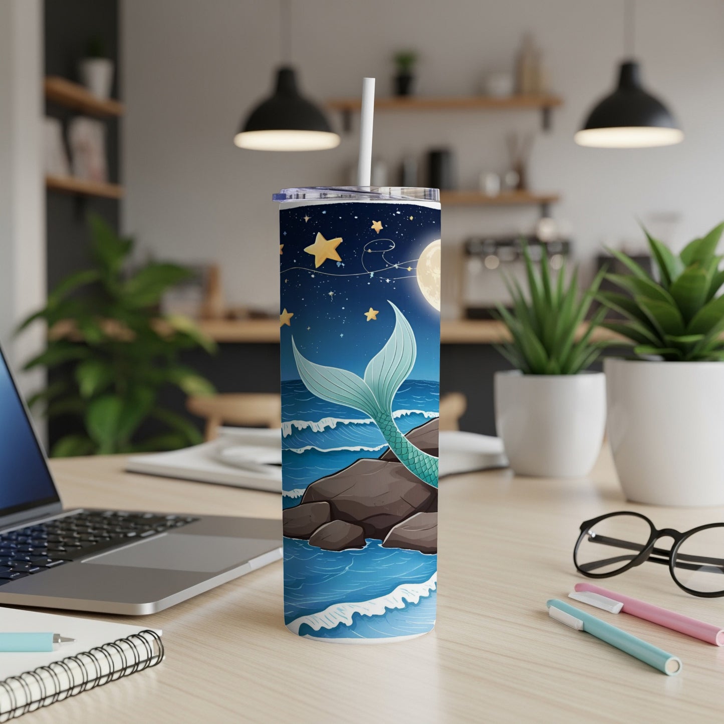 Mermaid tail design on a white tumbler with starry night and ocean background.