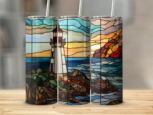 Three tumblers display a stained glass lighthouse scene at sunset.