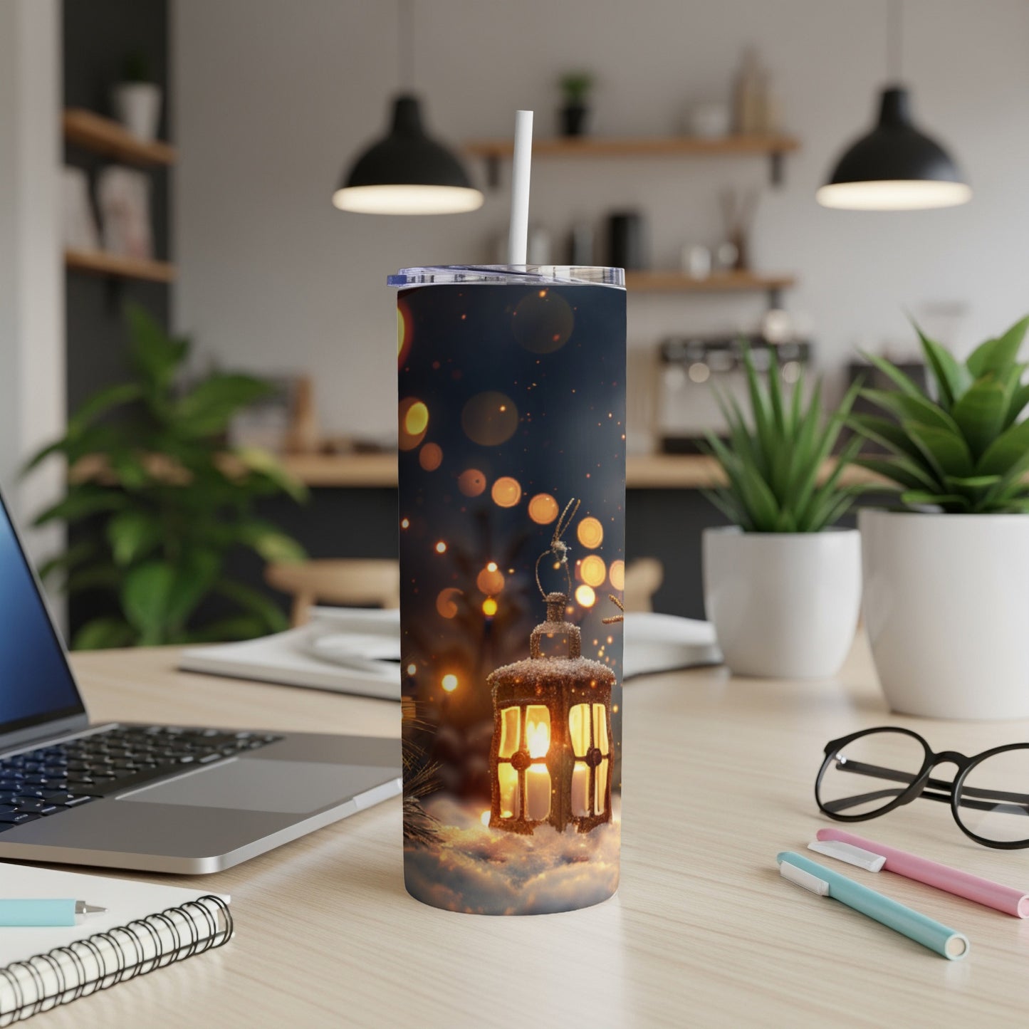 Tumbler with a glowing lantern on a snowy branch at night.