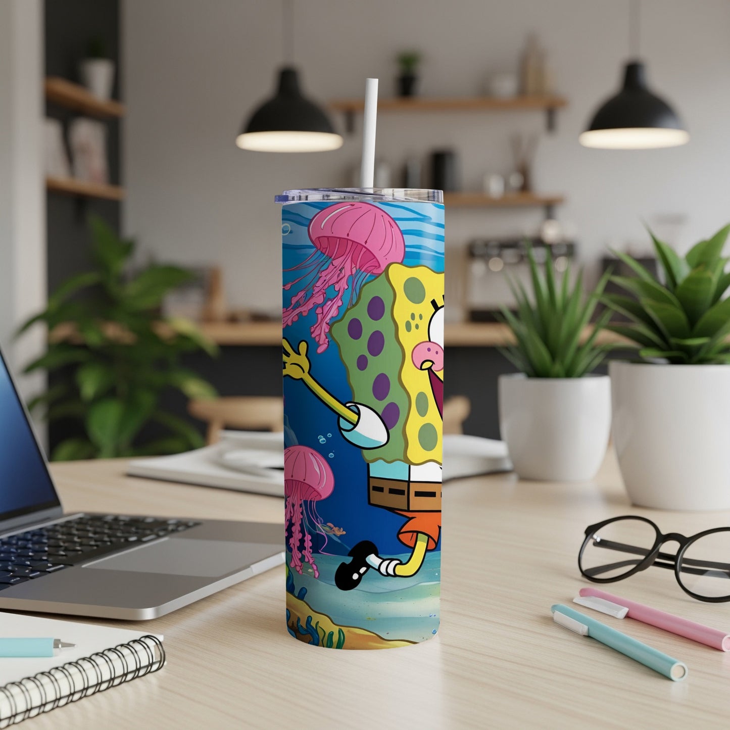 SpongeBob SquarePants tumbler with jellyfish and underwater background.