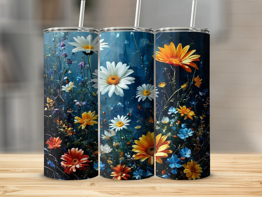 Three tumblers with floral designs and straw lids.