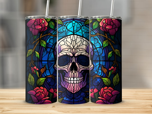 Stained glass skull with roses and vines on a tumbler.