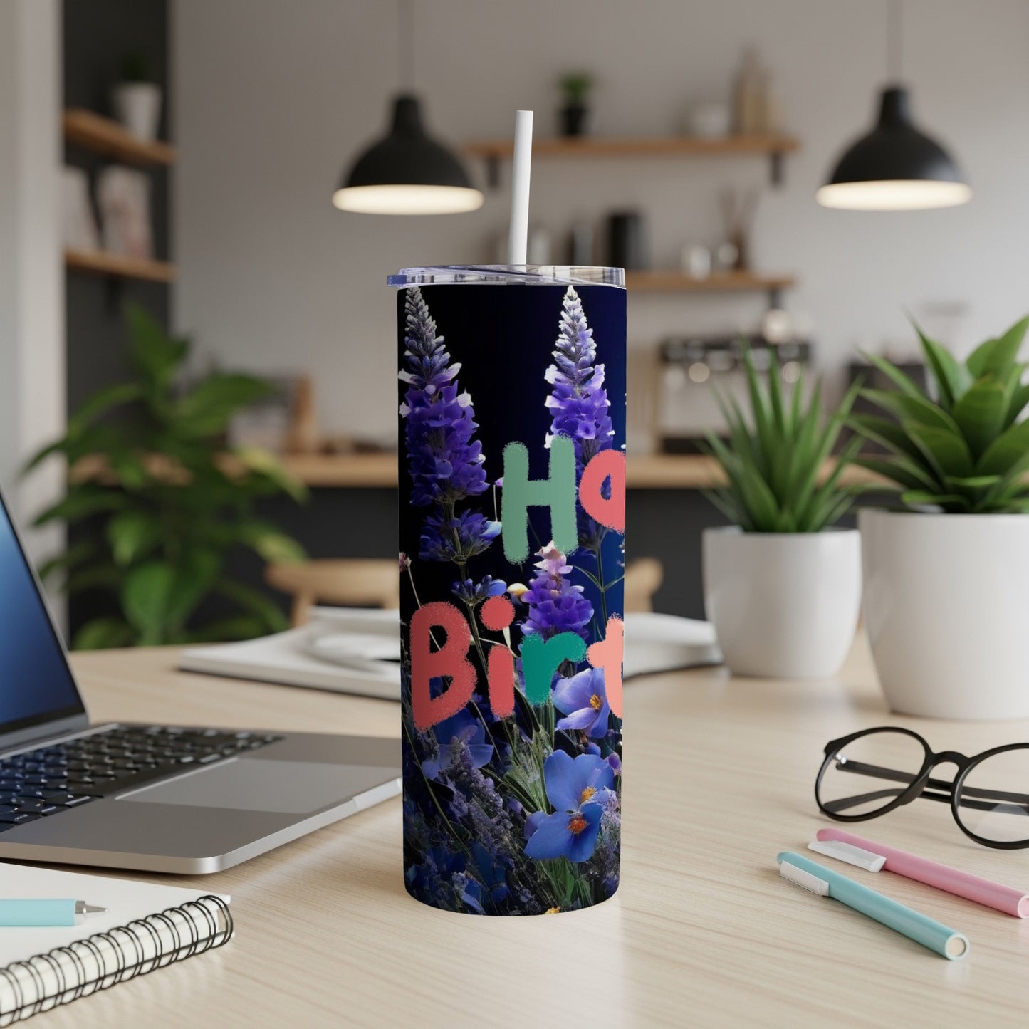 Tall tumbler with floral design and "Happy Birthday" text.