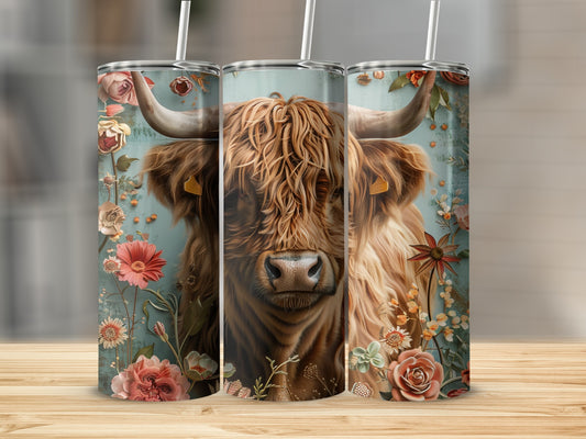 Highland cow with floral accents on a tumbler.
