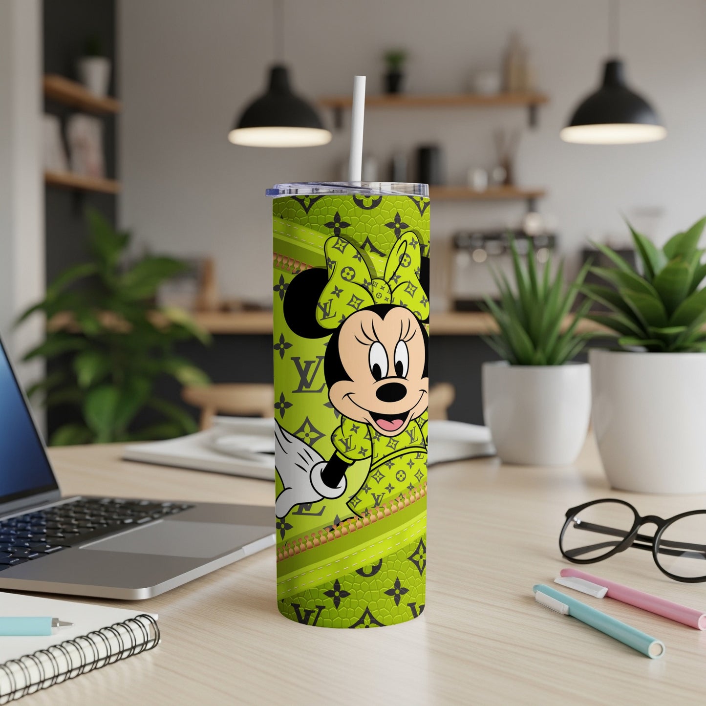 Minnie Mouse tumbler with green Louis Vuitton-inspired pattern.