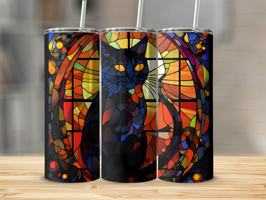 Black cat silhouette against stained glass window pattern on tumbler.