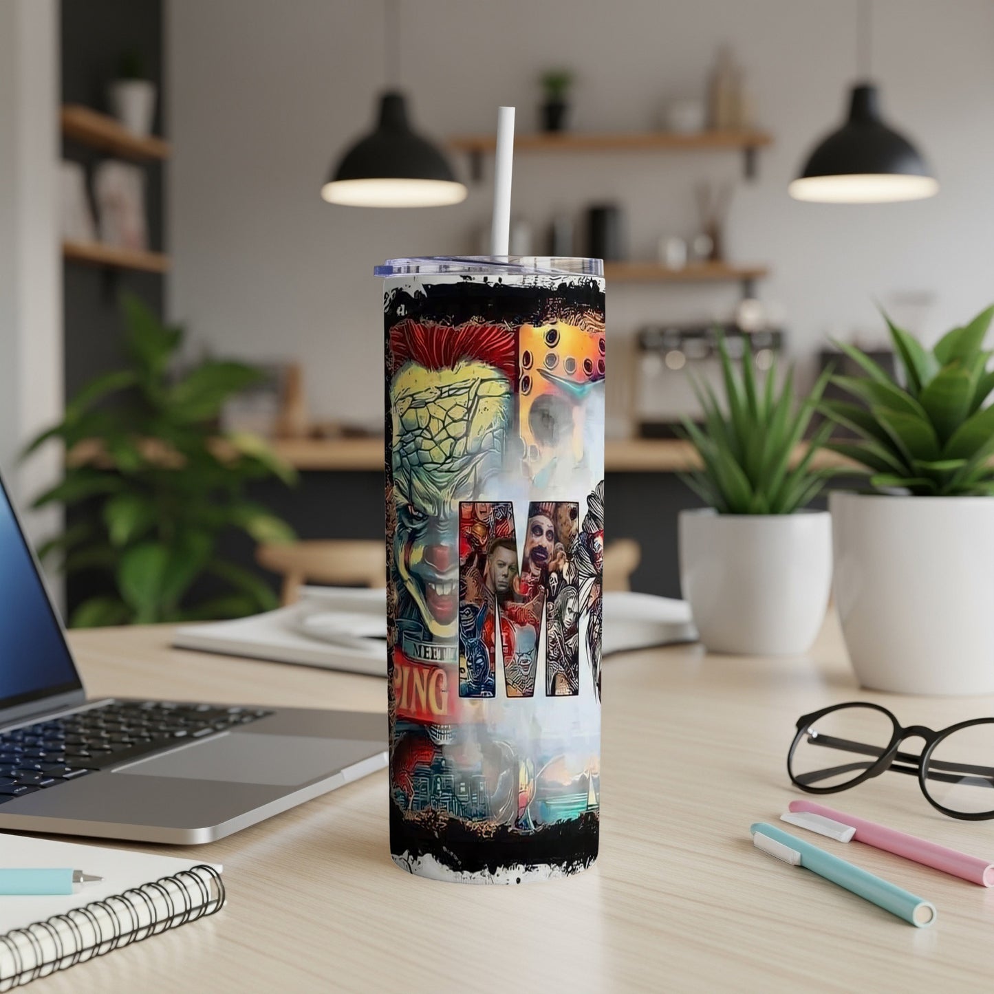 Tall tumbler with horror movie characters and a "Meet Me" sign.