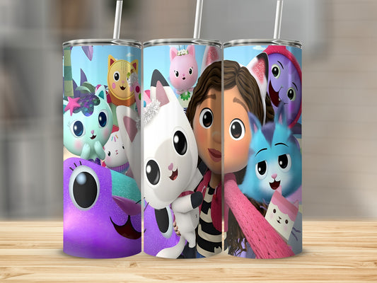 Gabby's Dollhouse characters on a tumbler with straw.