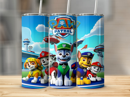 Paw Patrol characters on a blue tumbler with white straws.
