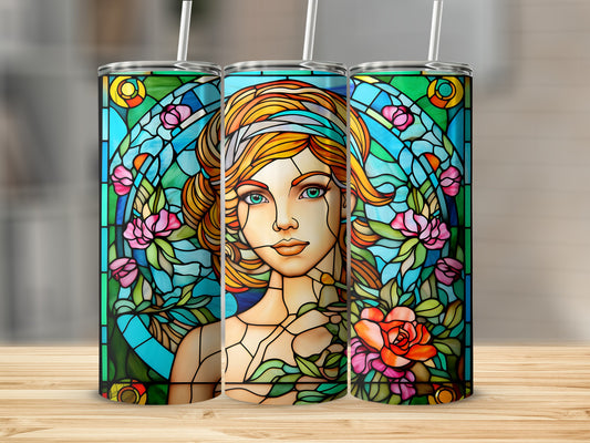 Stained glass tumbler featuring a woman with pink flowers and green leaves.