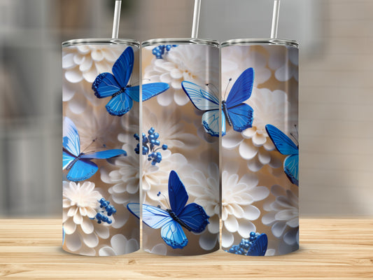 Three tumblers with blue butterflies and white flowers.