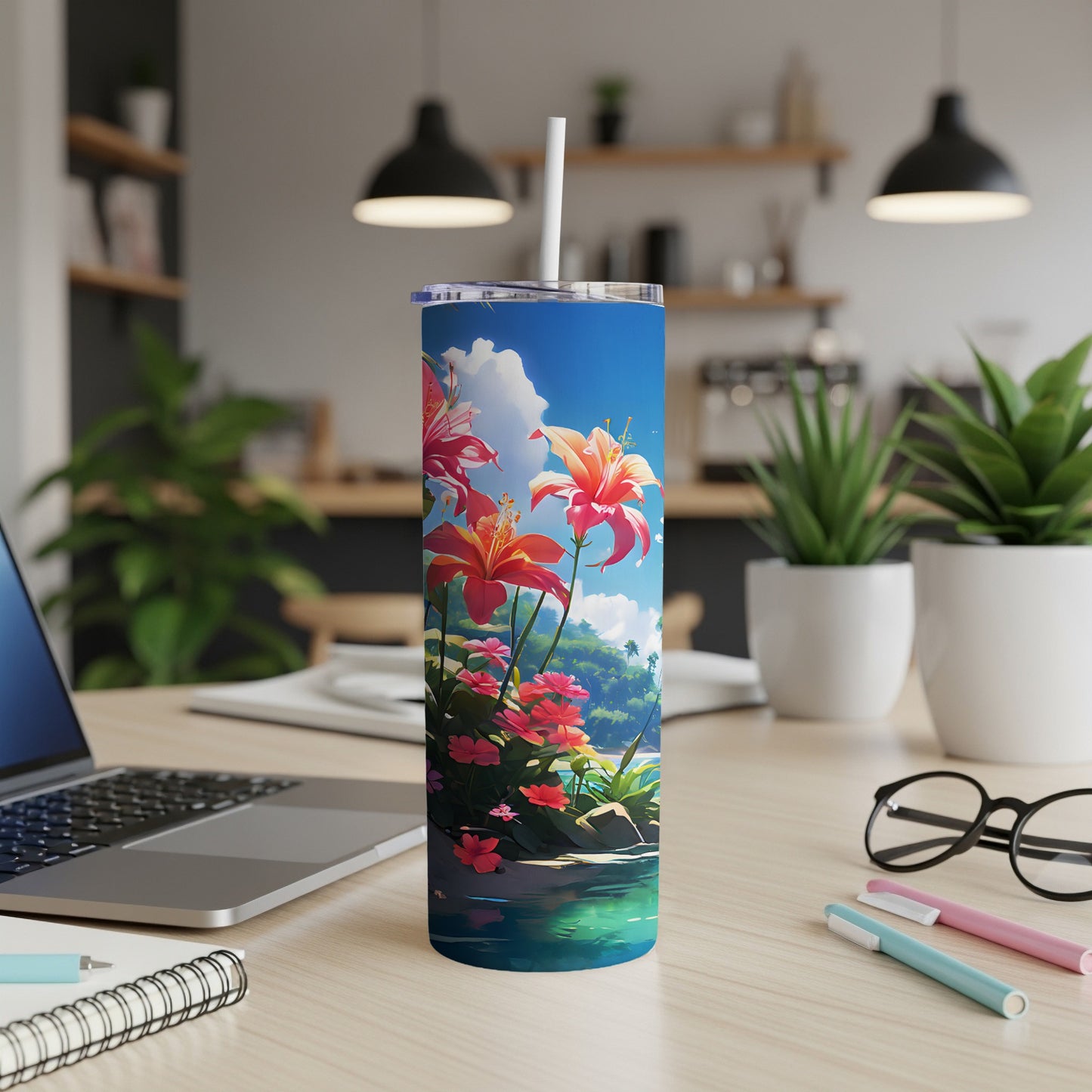 Tumbler with colorful tropical flowers and a scenic background.