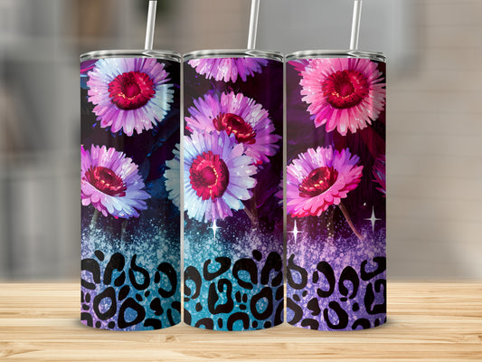 Three tumblers with floral and leopard print designs.