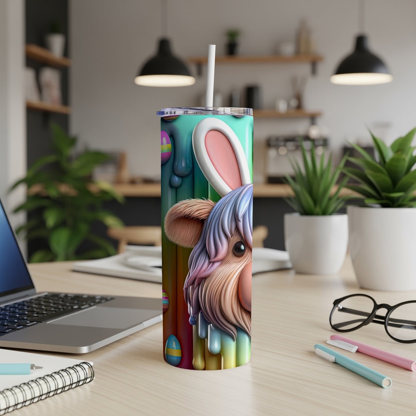Easter bunny tumbler with colorful drips and a fluffy face.