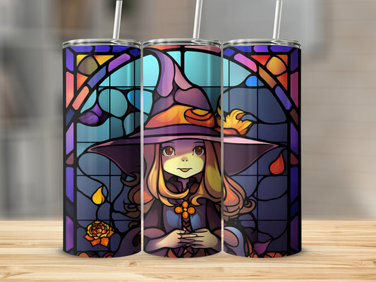 Stained glass witch with colorful hat and flowing robe on a wooden surface.