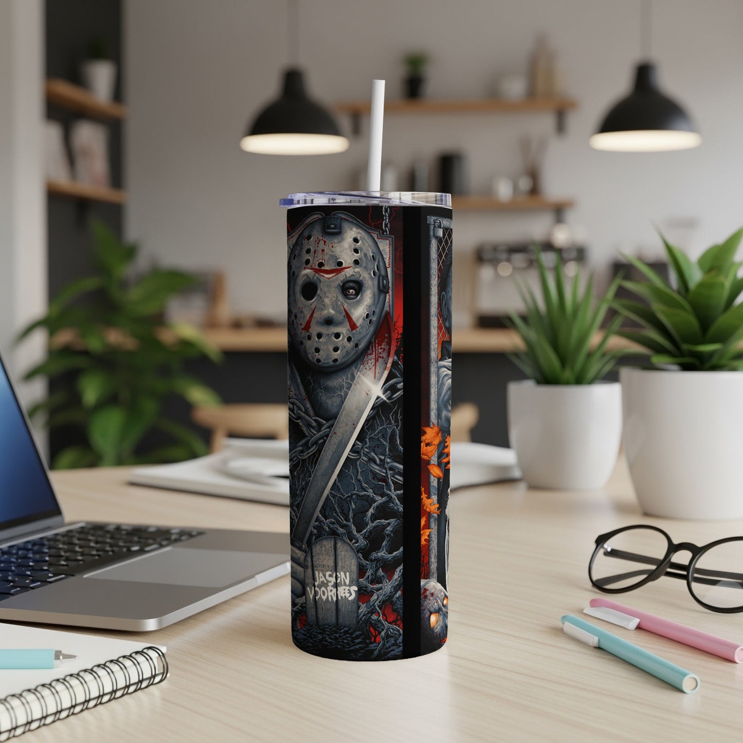 Tumbler featuring Jason Voorhees mask, machete, and tombstone graphic.