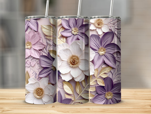 Three tumblers with floral designs and gold leaf accents.