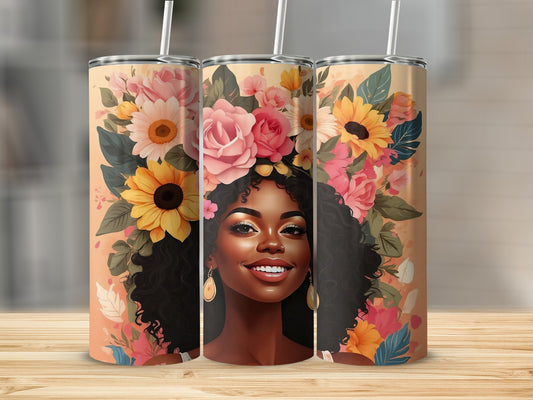 Woman with flowers in her hair on a patterned tumbler.