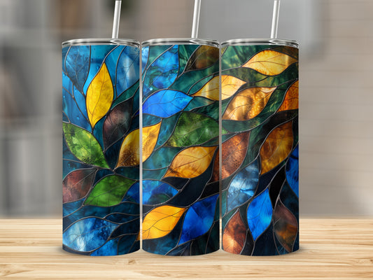 Three stained glass tumblers with autumn leaf patterns.