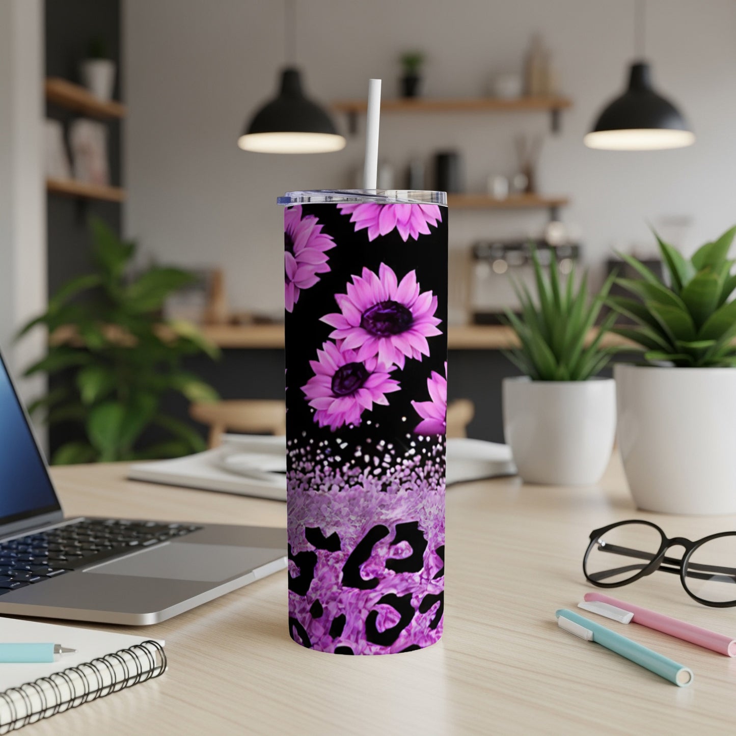 Purple glitter leopard print tumbler with pink floral pattern.