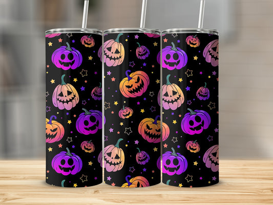 Three tumblers with a black background, featuring colorful Halloween pumpkins and stars.