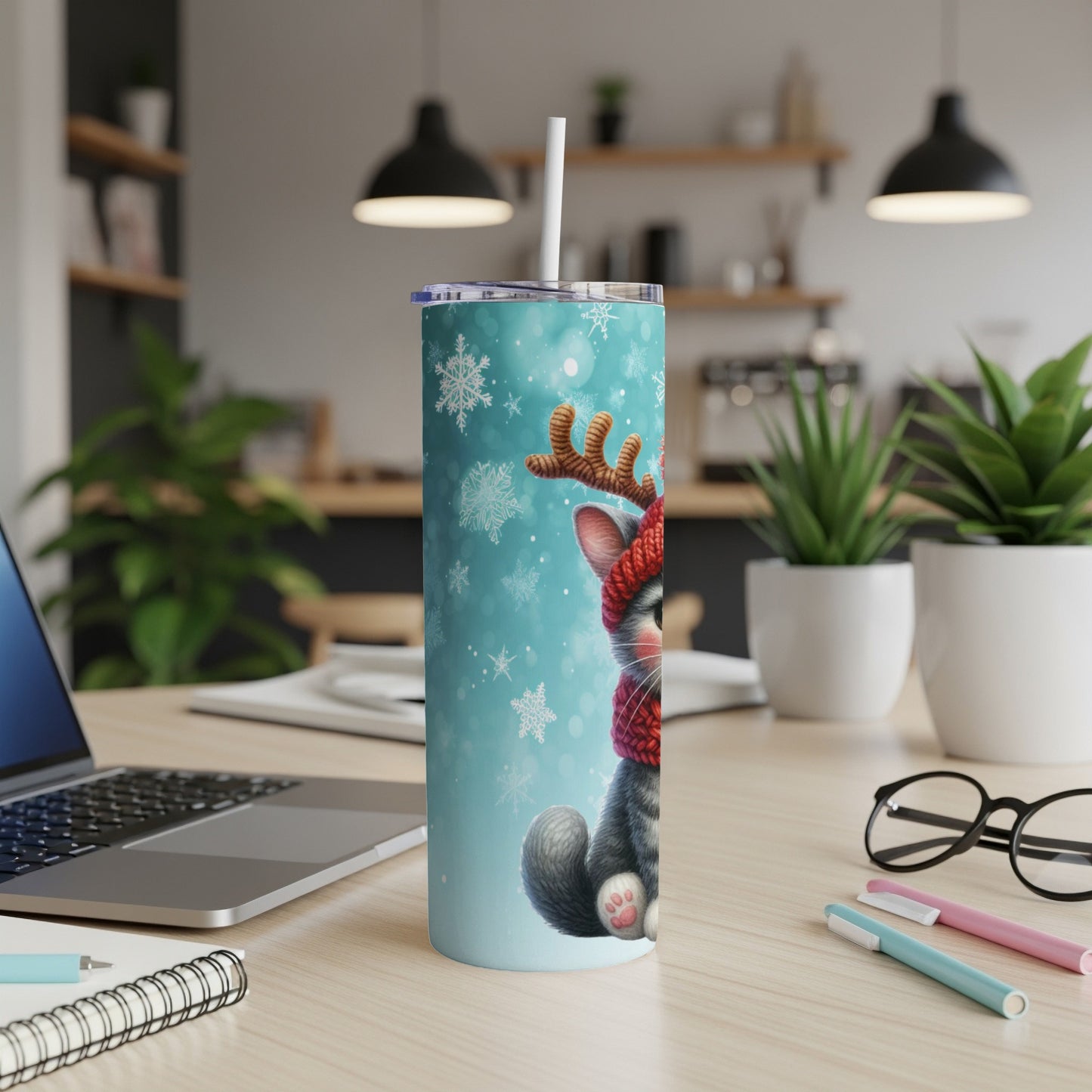 Turquoise cat tumbler with red scarf and reindeer antlers, snowflakes pattern.