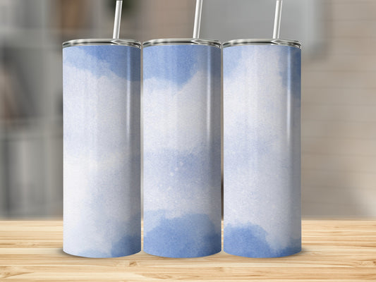 Three tumblers with a blue watercolor pattern and white straws.
