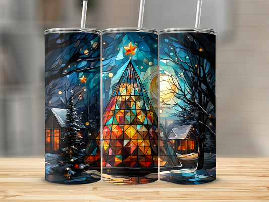 Three tumblers featuring a stained-glass Christmas tree in a snowy village scene.