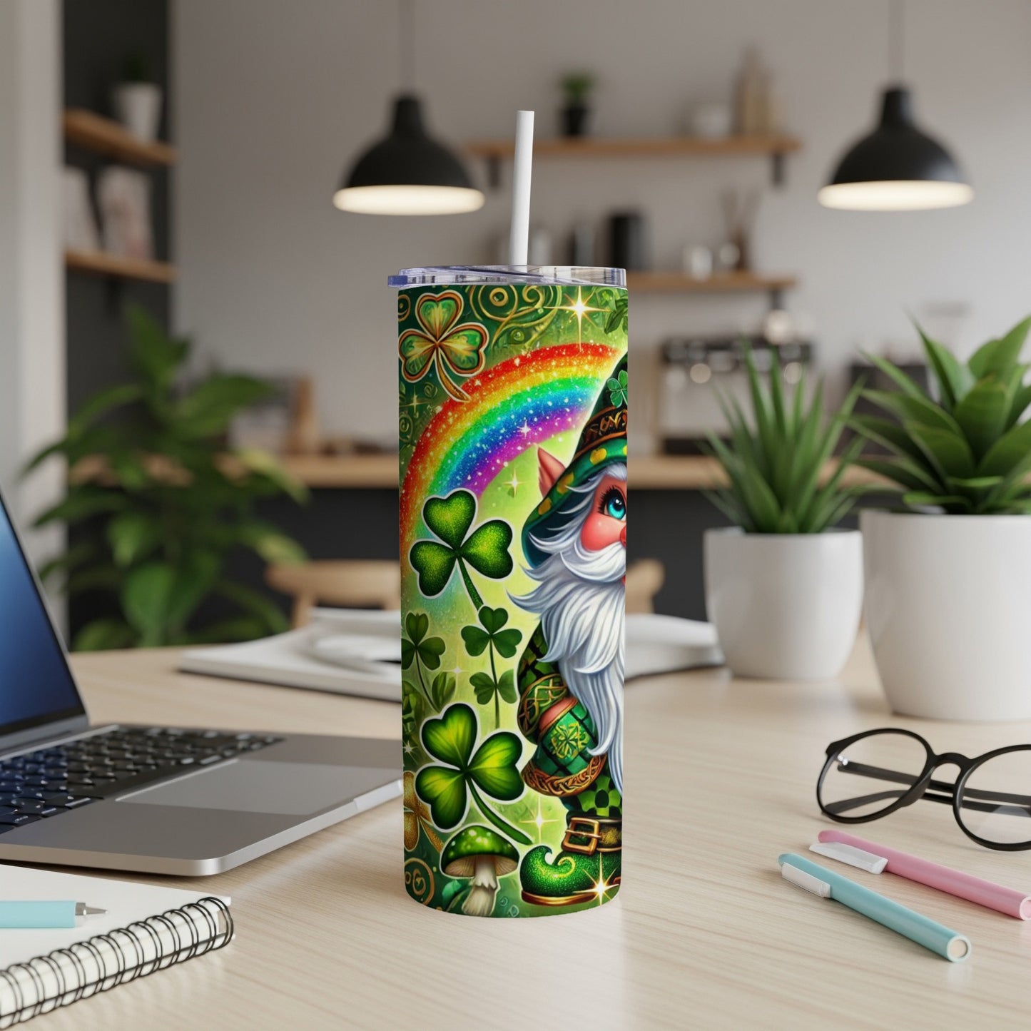 Leprechaun with rainbow and shamrocks on a green tumbler.