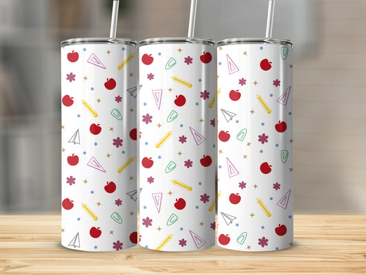 Three tumblers with school-themed patterns: apples, pencils, and stars.