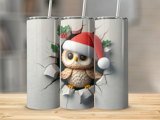 Owl wearing Santa hat peeking through cracked wall on tumbler.