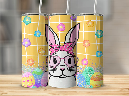 Easter bunny with glasses and bow, surrounded by colorful eggs and flowers.