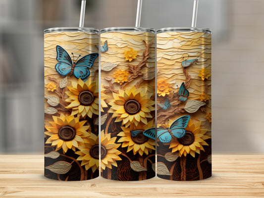 Three sunflowers and butterflies on a textured tumbler.