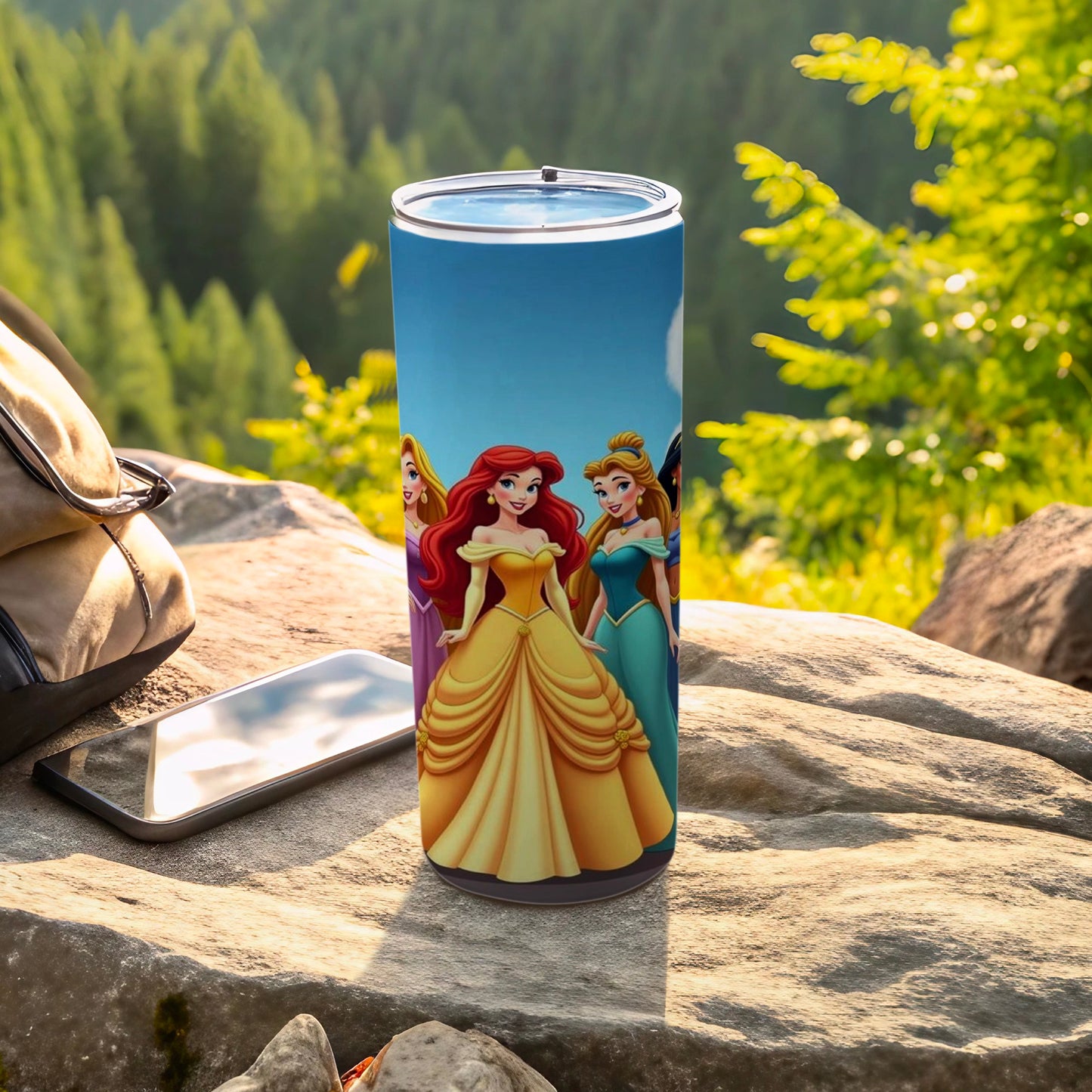 Disney Princesses Ariel, Belle, and Cinderella on a blue tumbler.