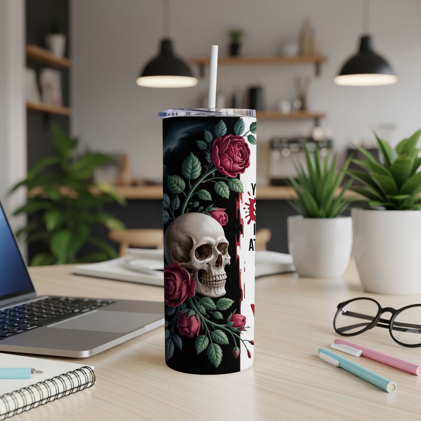 Tumbler with skull, roses, and red dripping text.