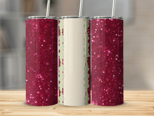 Three glitter tumblers with cream and red accents, displayed on a wooden surface.