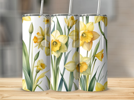 Three tumblers with a repeating yellow daffodil floral pattern.