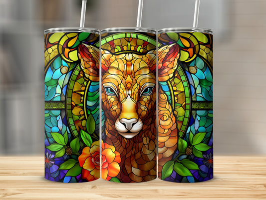Stained glass lion head with floral border on three tumblers.