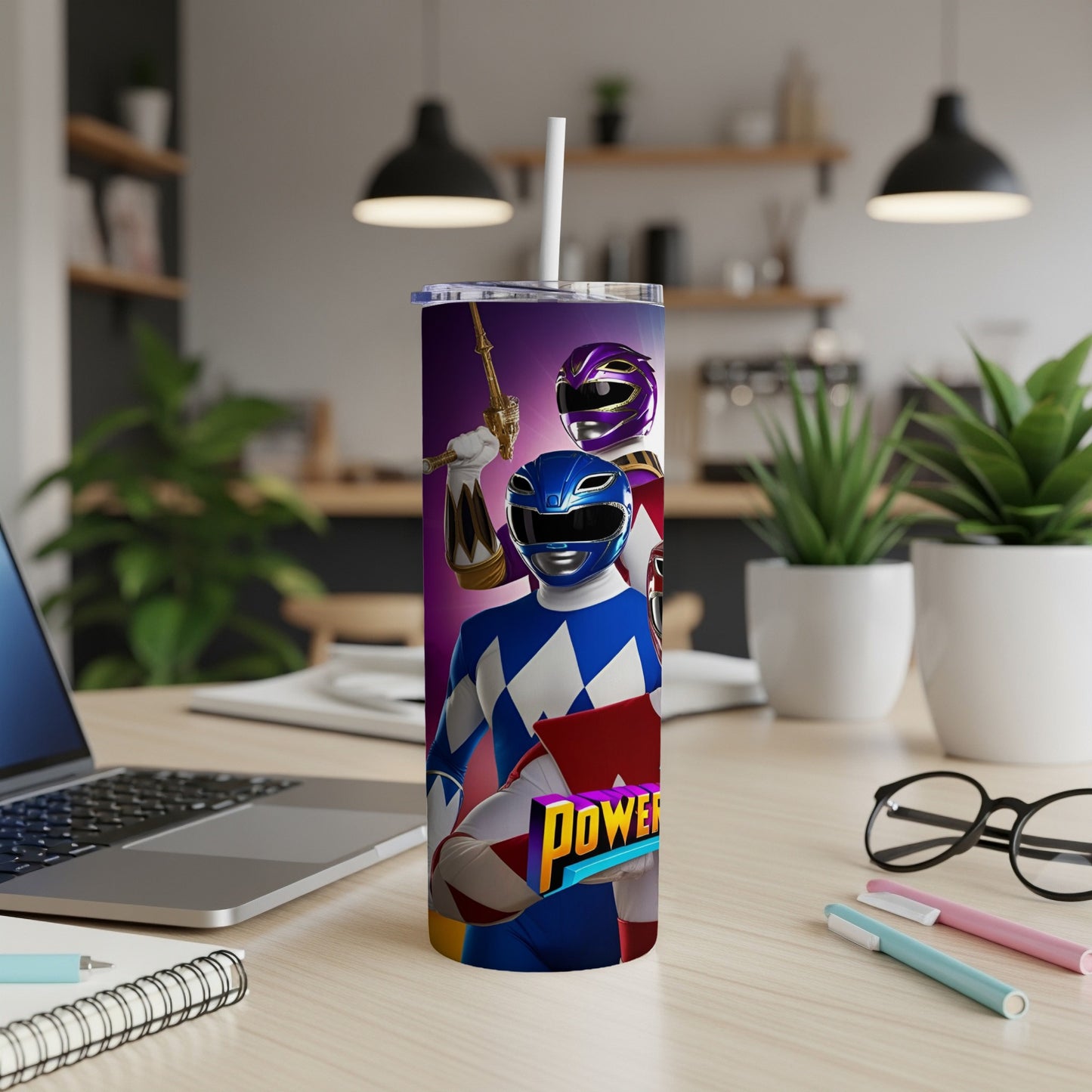 Blue and purple Power Rangers characters on a purple tumbler with straw.