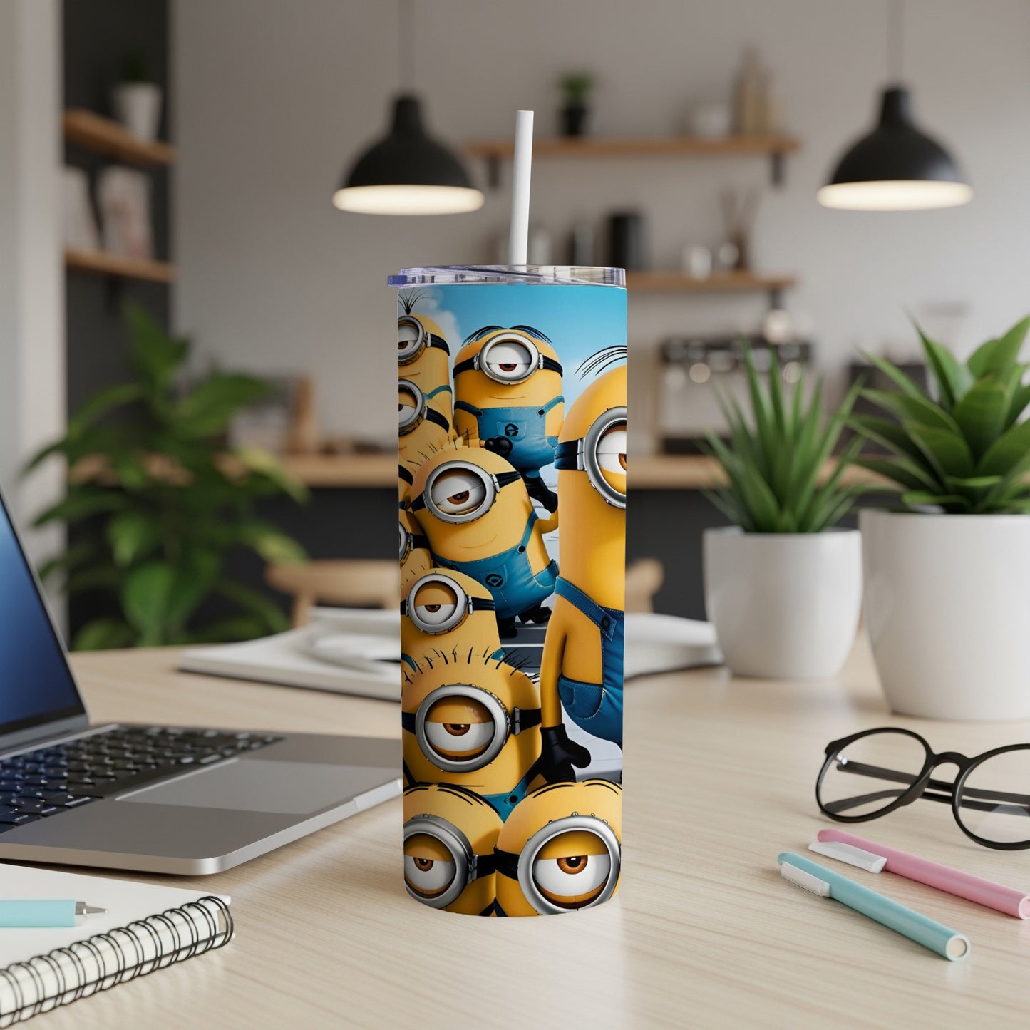 Tall tumbler featuring a group of yellow Minion characters from the Despicable Me franchise.