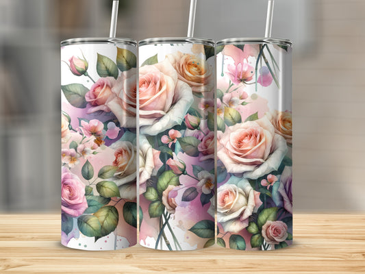 Three tumblers with pink roses and green leaves on a wooden surface.