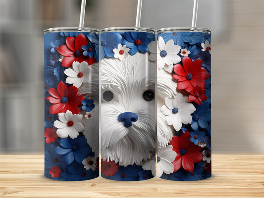 White dog surrounded by red, white, and blue flowers on a tumbler.
