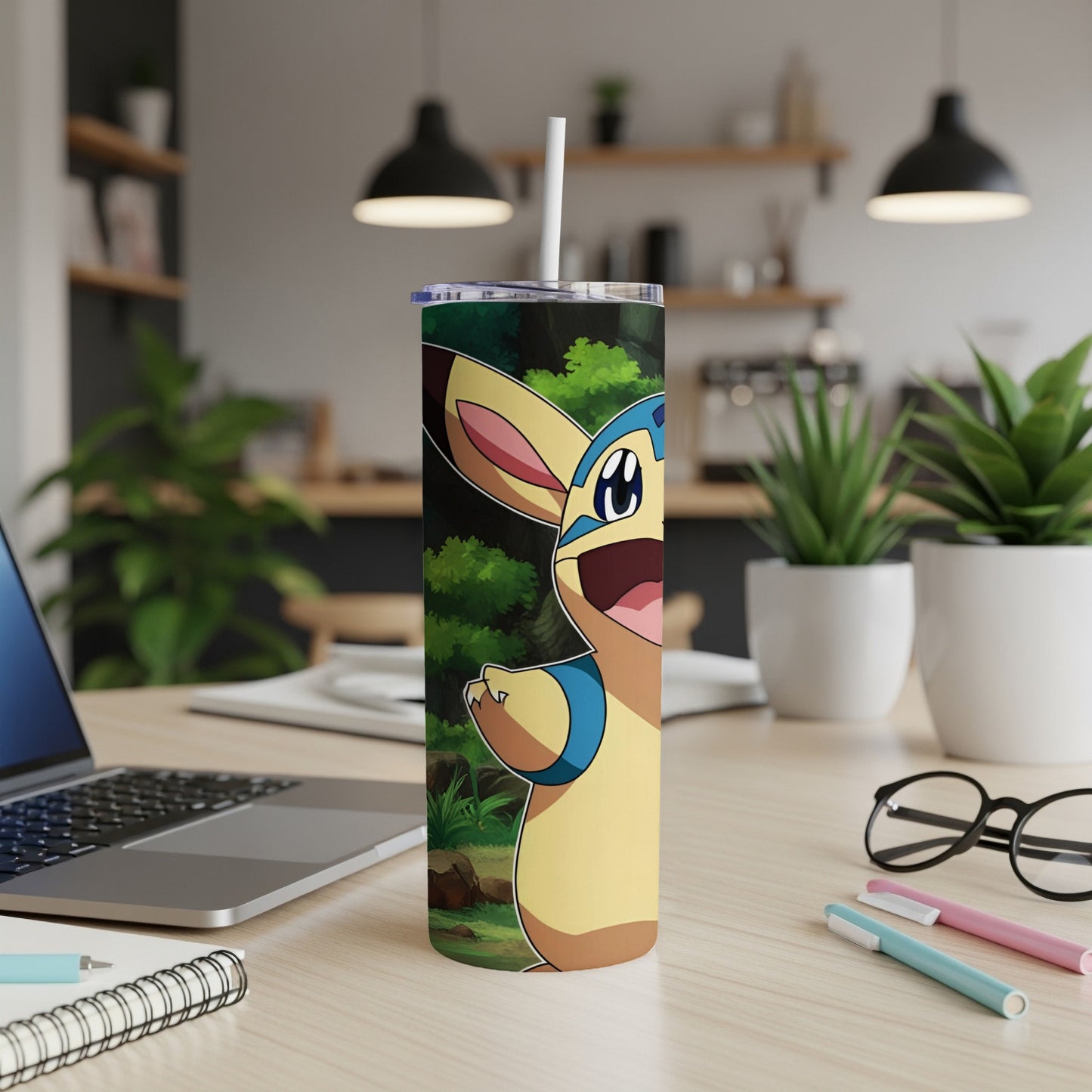 Yellow Pokemon character on a tall tumbler with a white straw.