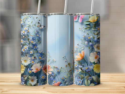 Floral tumbler design with butterflies and blue sky background.